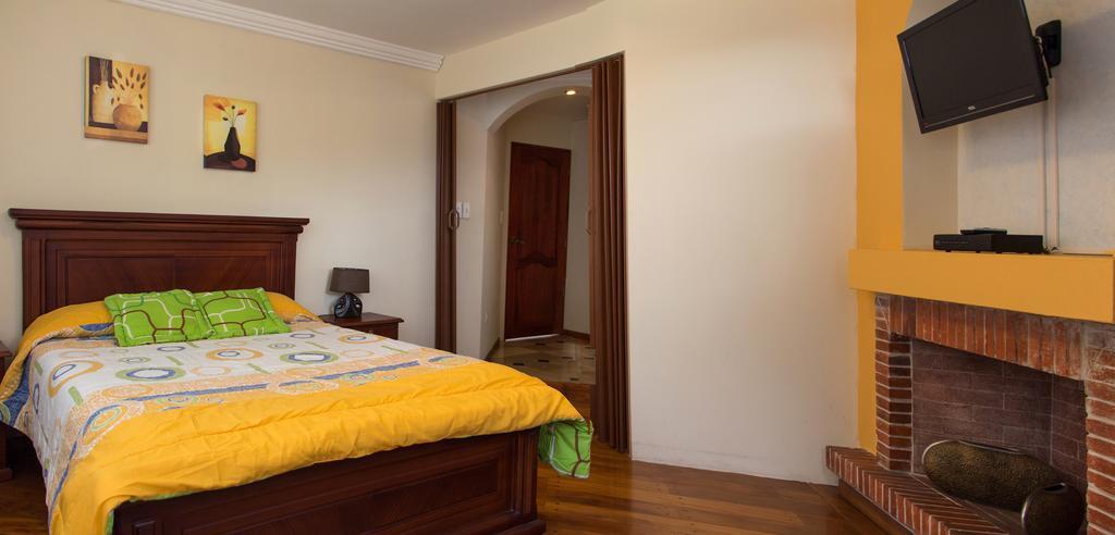 Altura Rooms & Suites Quito Quarto foto